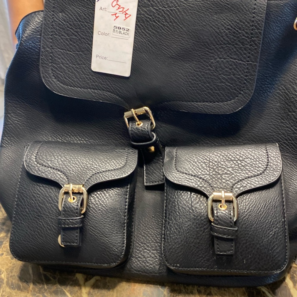 Black leather backpack.